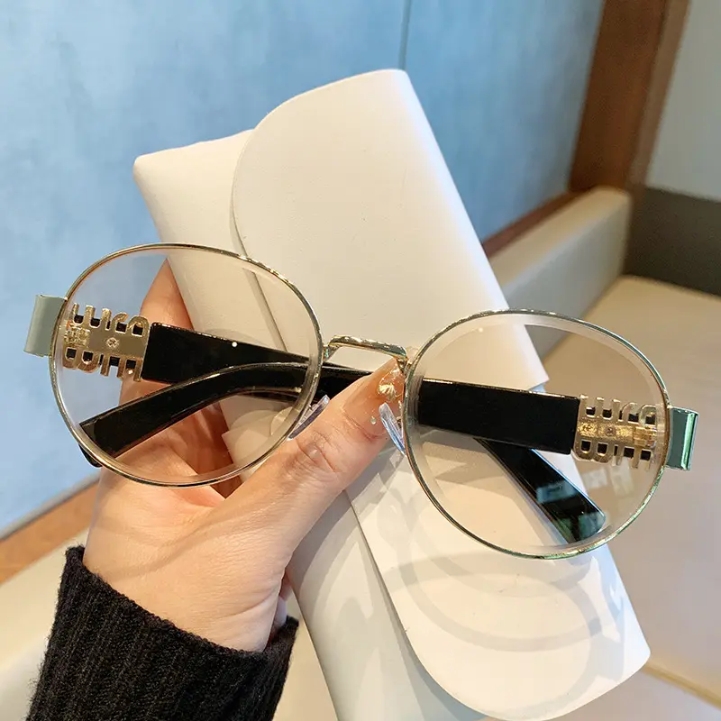 Miu miu redondos cristal champán