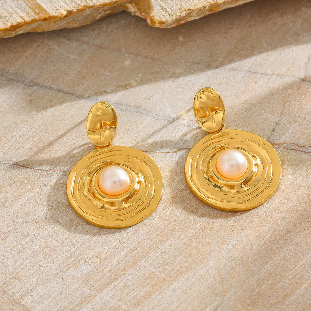 Maxi aretes colgantes con detalle de Perla