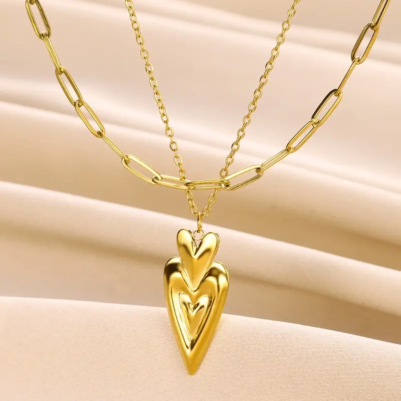 Doble capas corazón dorado