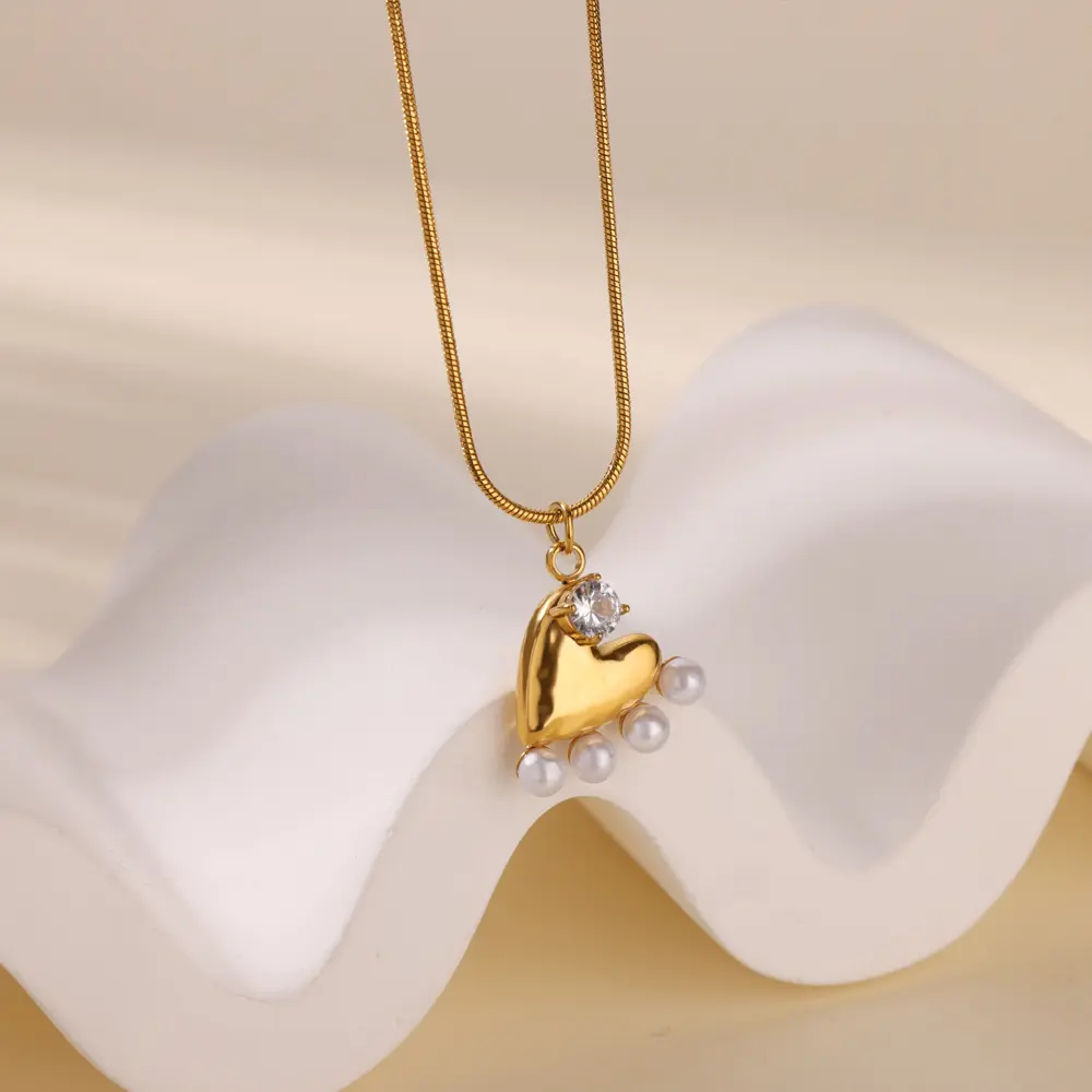 Corazoncito con punto de pulo y Perla