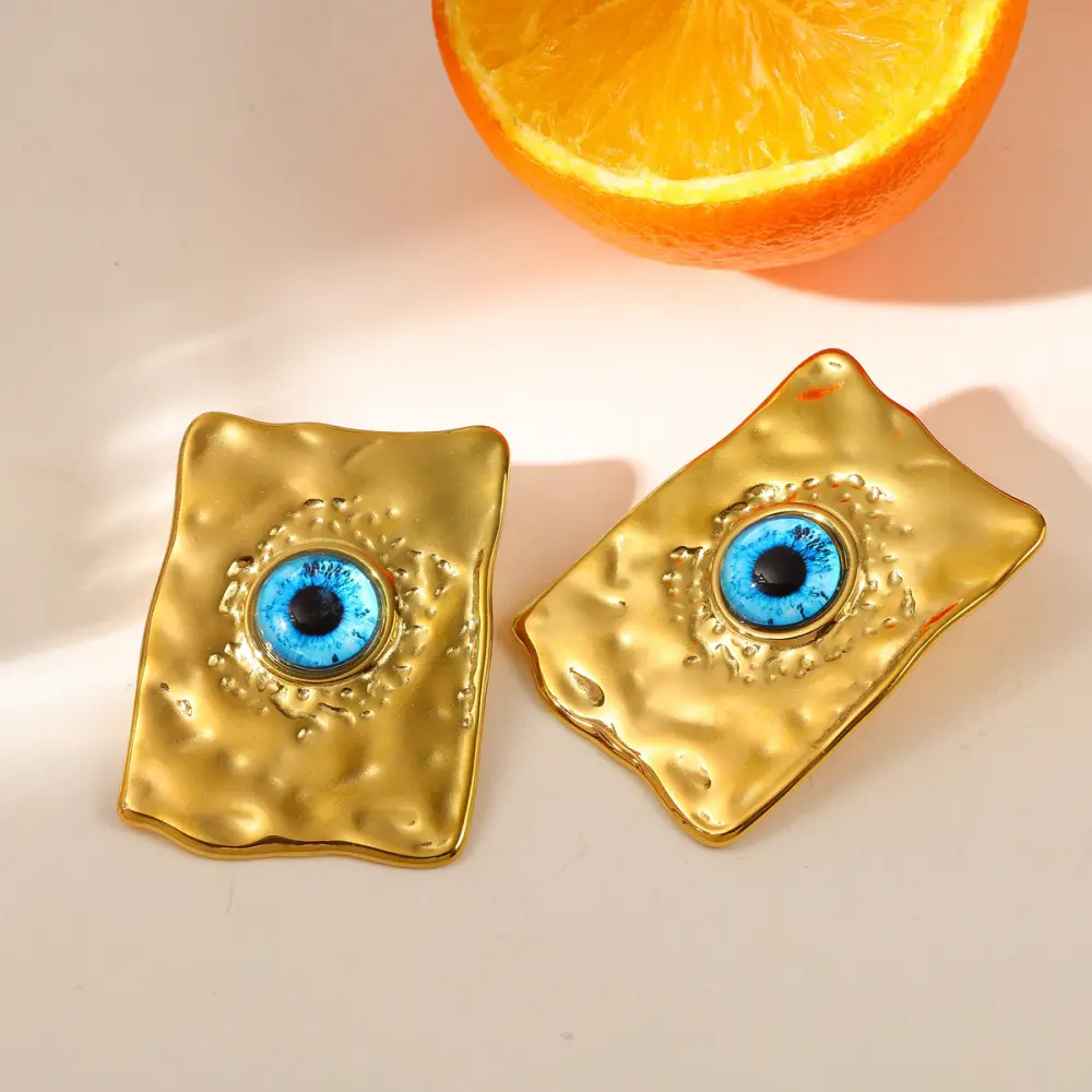Maxi aretes ojo realista